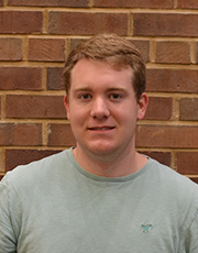 Jacob Dowell poses for a photo at the Chaifetz School of Business