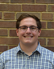 Jason Ruka poses for a photo at the Chaifetz School of Business