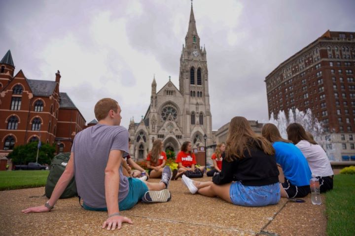 Students Talking Next to Fountain