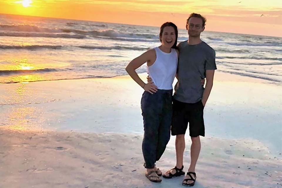 Nick Steinauer on beach at sunset