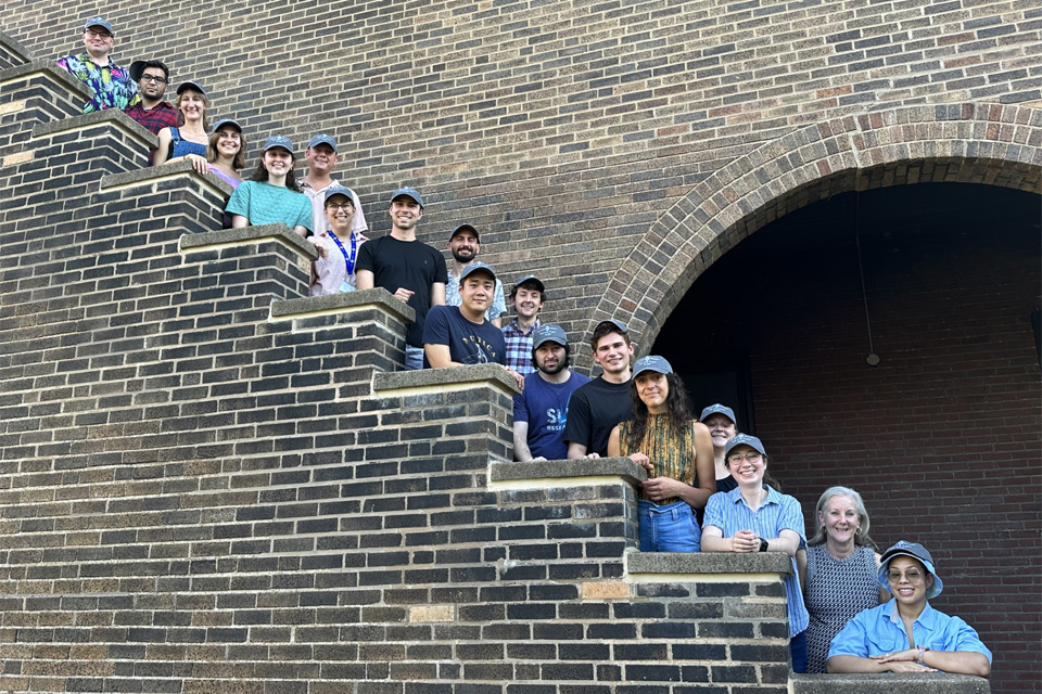 The MD / PhD candidates gathered on the staircase for a group photo