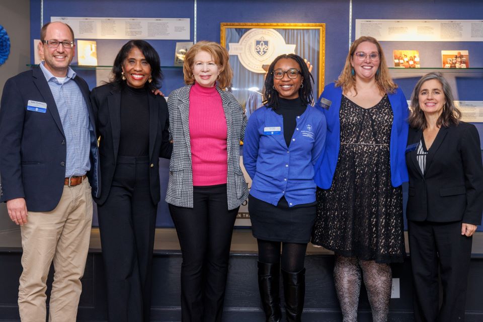 A group pose for photo.
