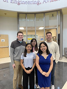 Joseph Capps, Connor Freeman, Andrea Regina Silva, Siyi Wang and Sherry Wisdom posed in McDonnell Douglas Hall